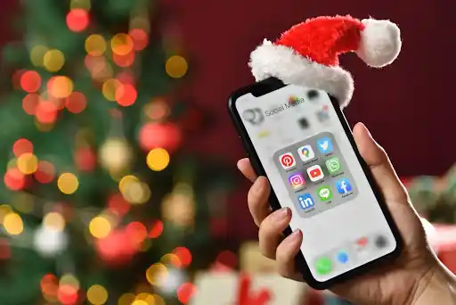 Holiday themed image featuring a mobile device